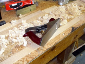 Hand planing the laminates to the correct thickness