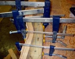 All the laminates bent and clamped into position